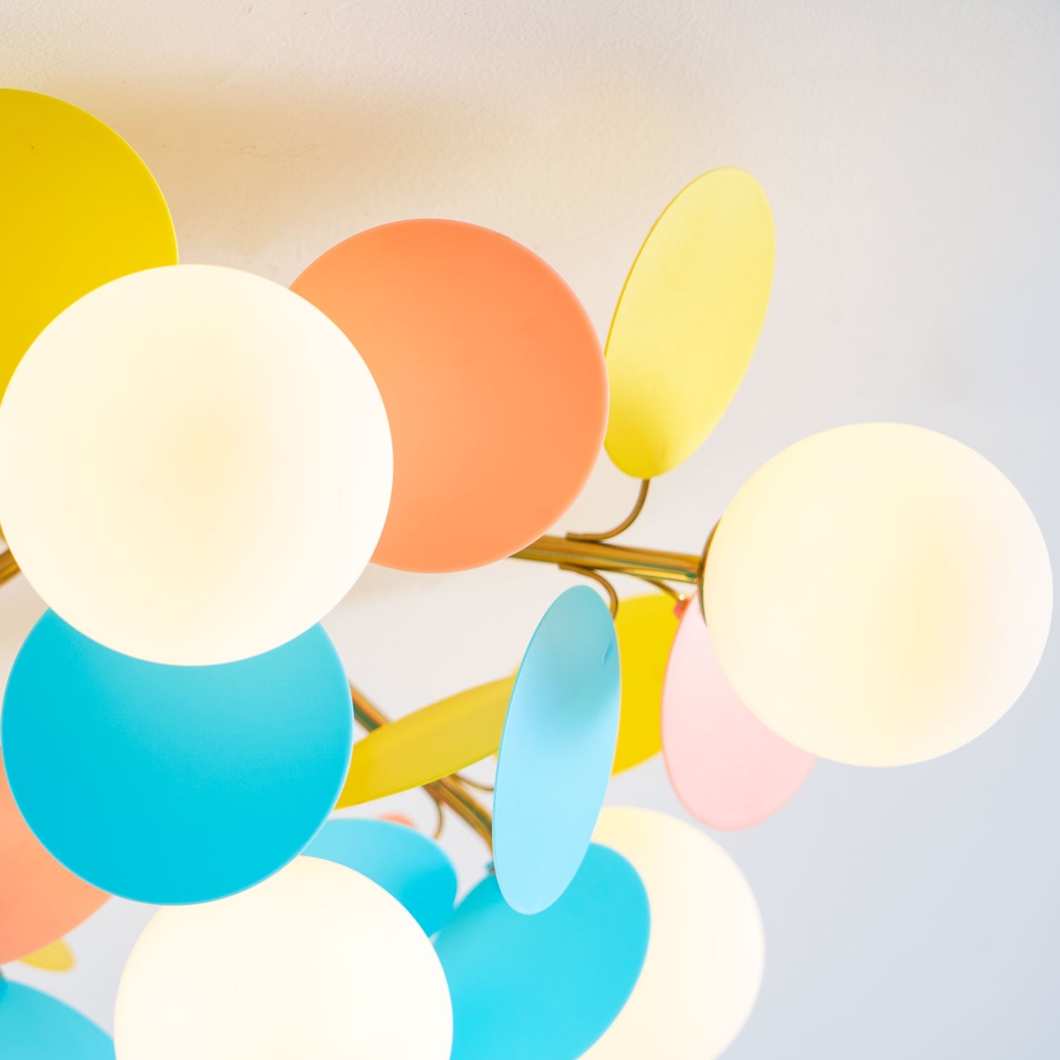 Detail View of Colorful Petal Shades and Frosted Glass Globe