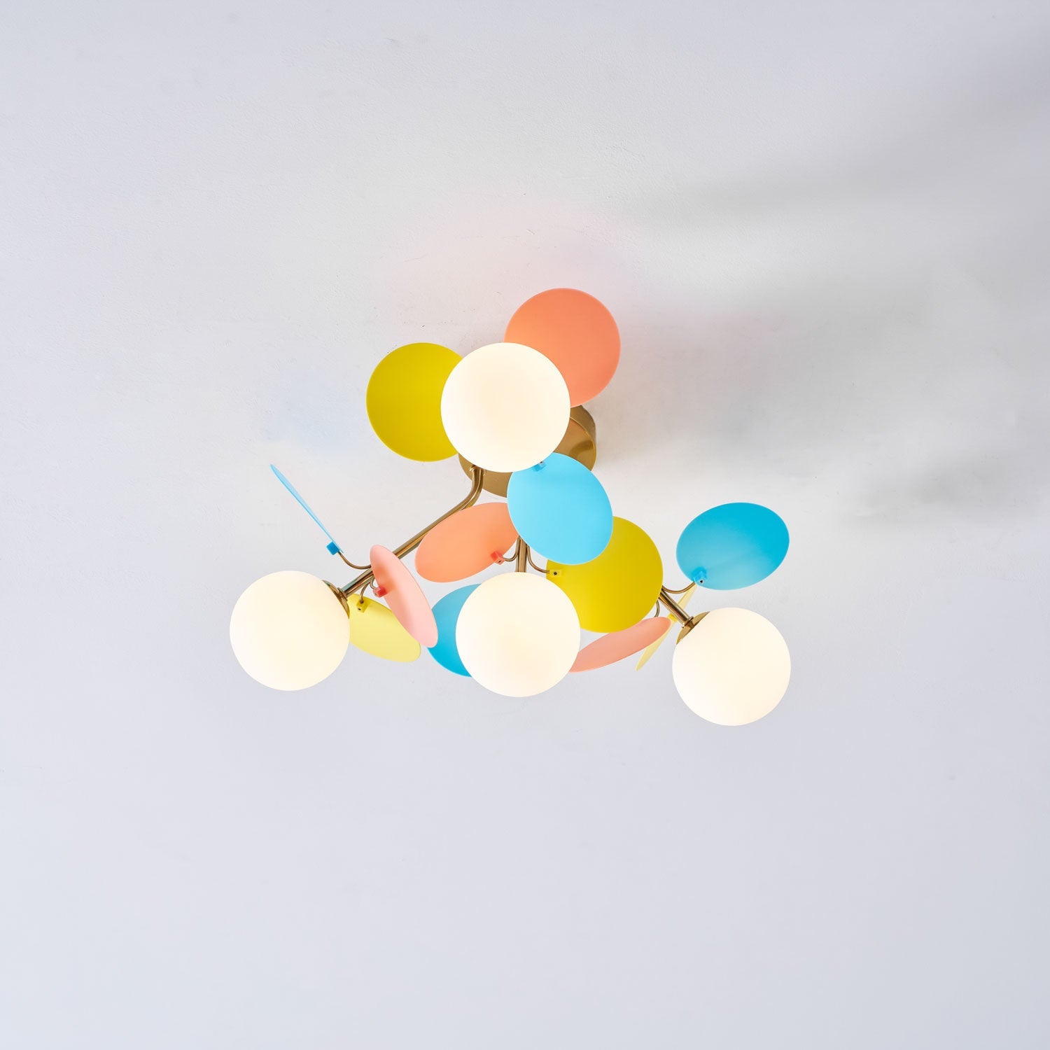 Bottom Up View of Glowing Colorful Petal Ceiling Light
