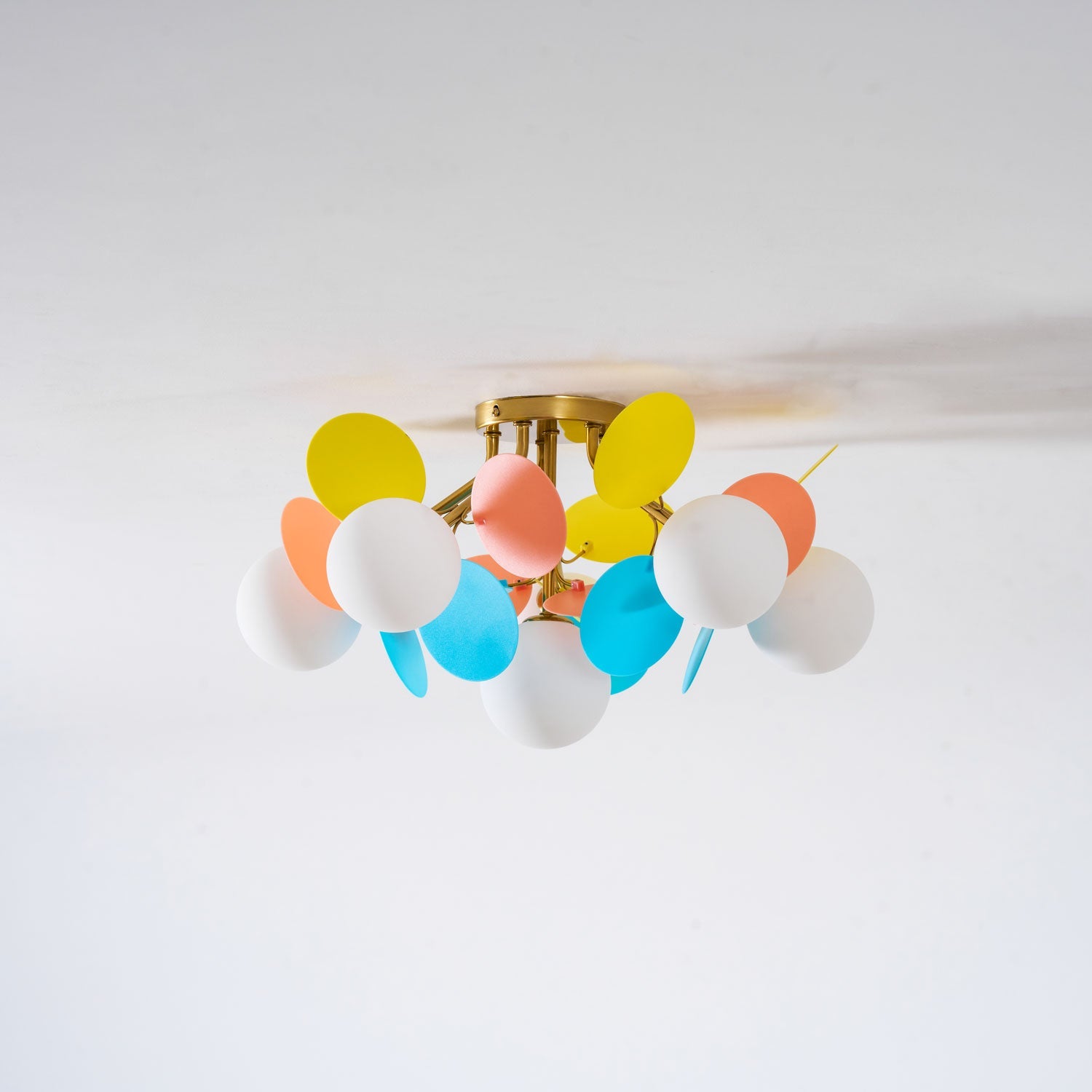 Bottom Up View of Colorful Petal Globe Light in Dark Room