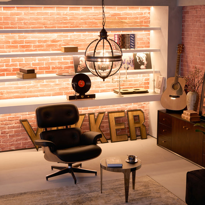 Industrial Brass Globe Pendant Light Over Lounge Area