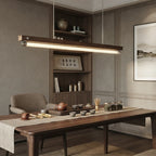 Modern Wood and Metal Pendant Light in Minimalist Dining Area