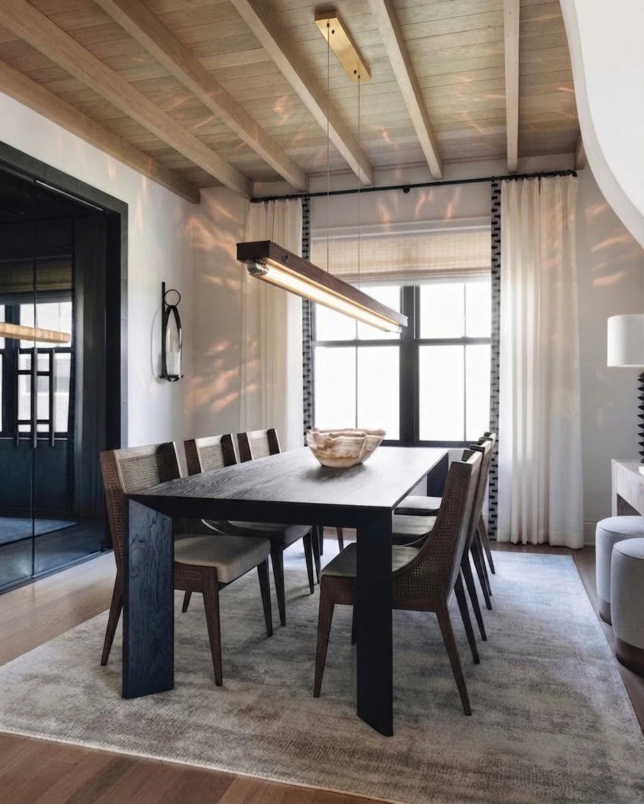 Modern Linear Pendant Light Over Rustic Dining Table