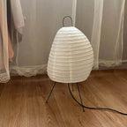 Modern Tripod Table Lamp in Cozy Room Setting