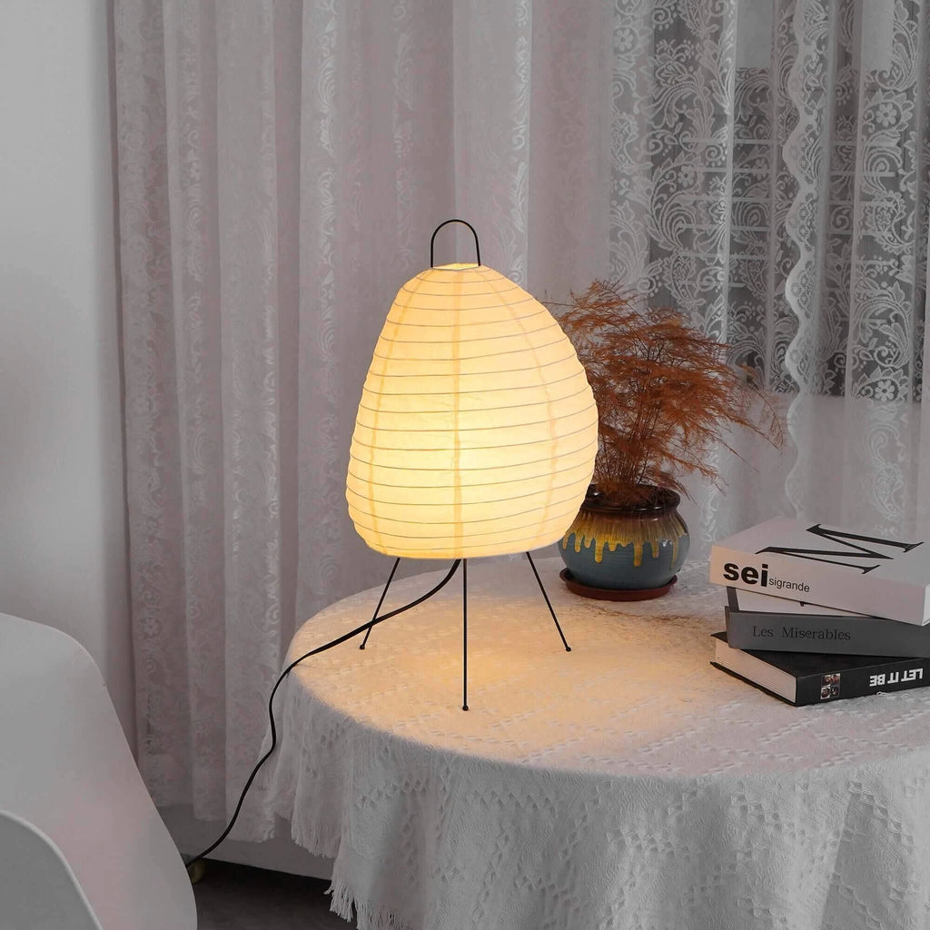 Illuminated Modern Paper Lantern Table Lamp on Round Table