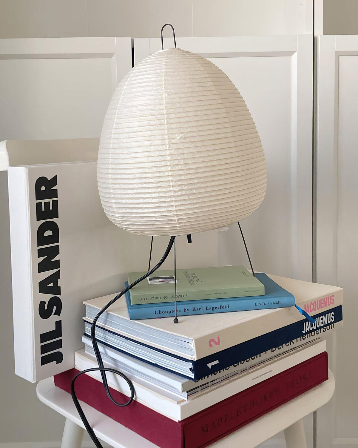 Akari Paper 1A Table Lamp stacked with books study table decoration