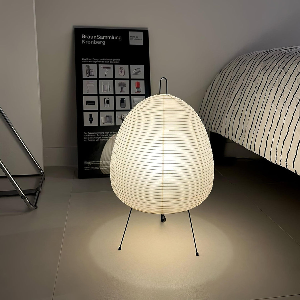 Akari Paper 1A Table Lamp next to bed japandi bedroom ambient lighting