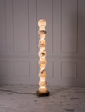 Illuminated Modern Stacked Alabaster Sphere Floor Lamp Studio Shot on Pure White Background