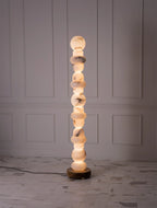 Illuminated Modern Stacked Alabaster Sphere Floor Lamp Studio Shot on Pure White Background