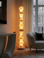 Illuminated Modern Beaded Alabaster Floor Lamp in Dramatic Living Room Setting