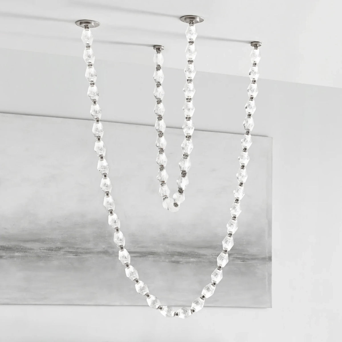 Modern Symmetrical Beaded Curve Chandelier Display