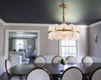 Modern Brass Band Chandelier in Sophisticated Dining Hall
