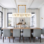 Modern Alabaster Linear Chandelier in Bright Contemporary Dining Room Setting