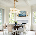 Modern Long Brass Band Chandelier in Elegant Dining Space