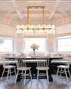 Modern Long Brass Band Chandelier in Bright Open Concept Space