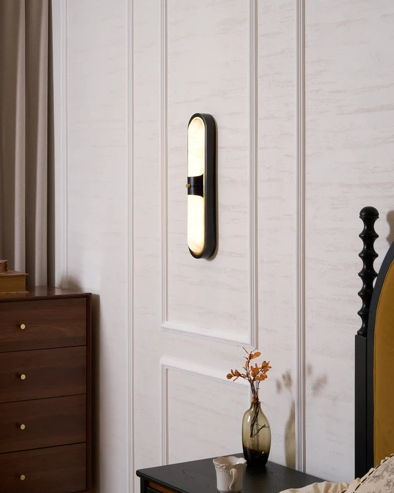 Modern Black Frame Alabaster Wall Sconce in Master Bedroom Interior