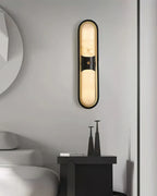 Modern Black Frame Alabaster Wall Sconce in Minimalist Bedroom Decor