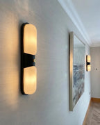 Modern Alabaster Double Oval Wall Sconce in Elegant Hallway Corridor
