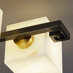 Close Up View of Black Metal Frame and Gold Connector Hardware Details
