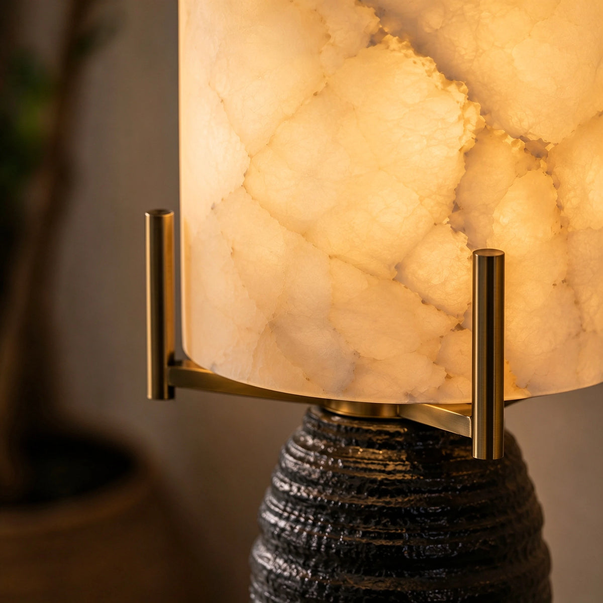 Close Up View of Illuminated Alabaster Cylinder Shade and Warm Glow Details