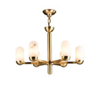 Modern Brass Multi-Head Alabaster Cylinder Chandelier with Warm Light on Pure White Background