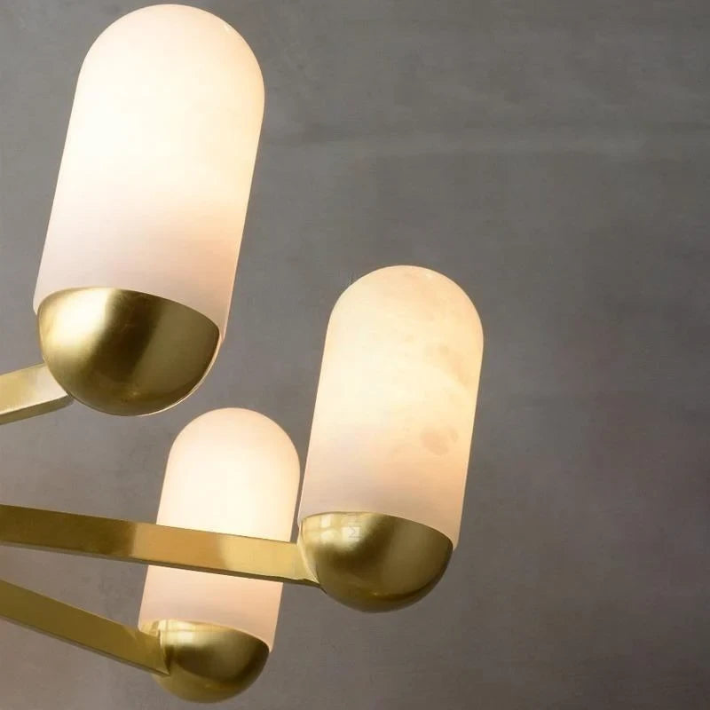 Close Up View of Alabaster Cylinder Shades and Warm Glow Details