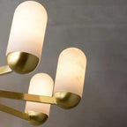 Close Up View of Alabaster Cylinder Shades and Warm Glow Details
