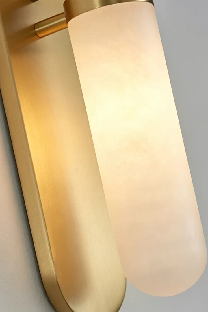 Illuminated Modern Alabaster Wall Sconce Studio Shot on White Background