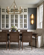 Modern Alabaster Wall Sconce in Elegant Dining Room Setting   