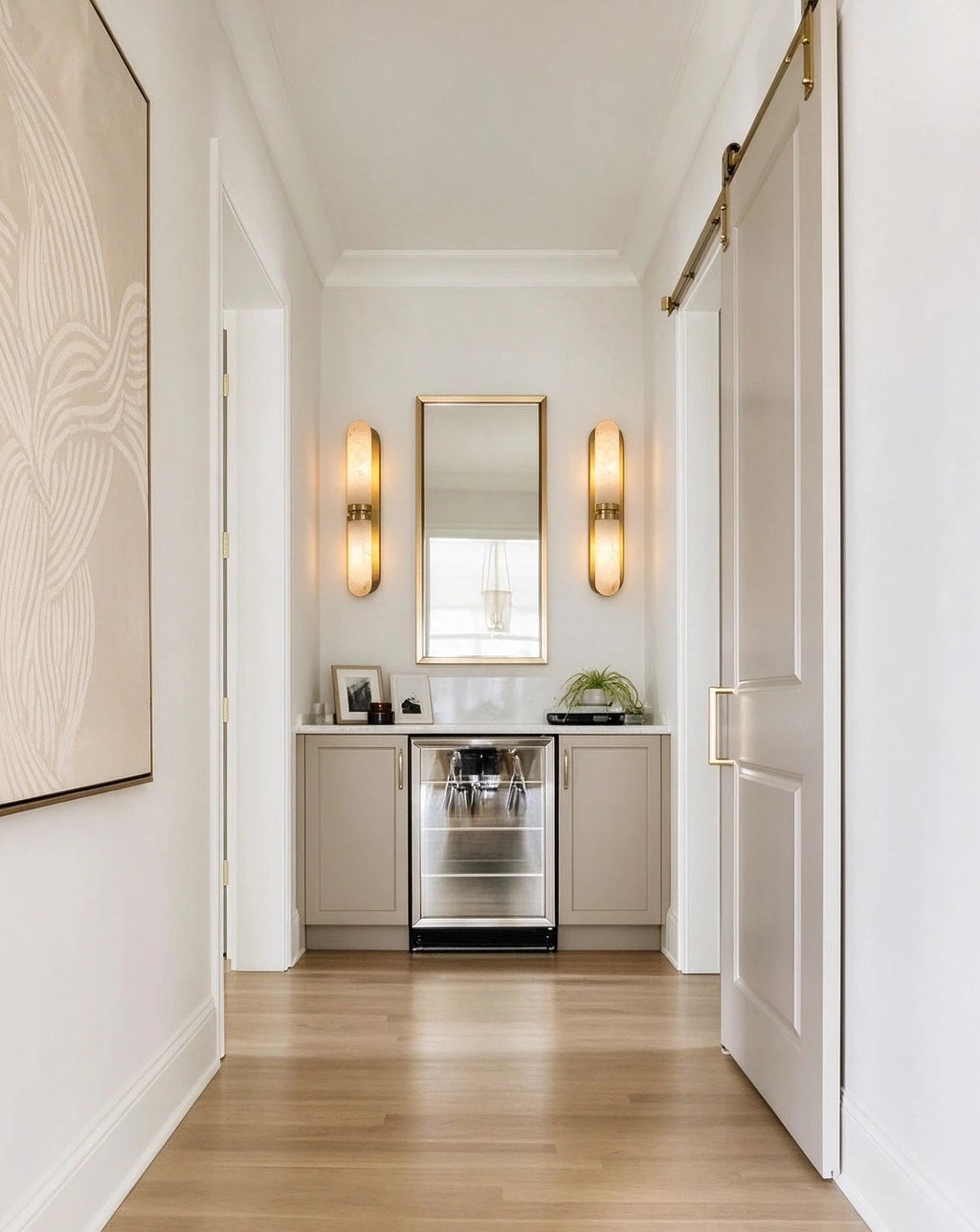 Modern Brass Alabaster Wall Sconce in Sophisticated Hallway Corridor