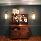 Traditional Brass Wall Sconces Over Entryway Console Table