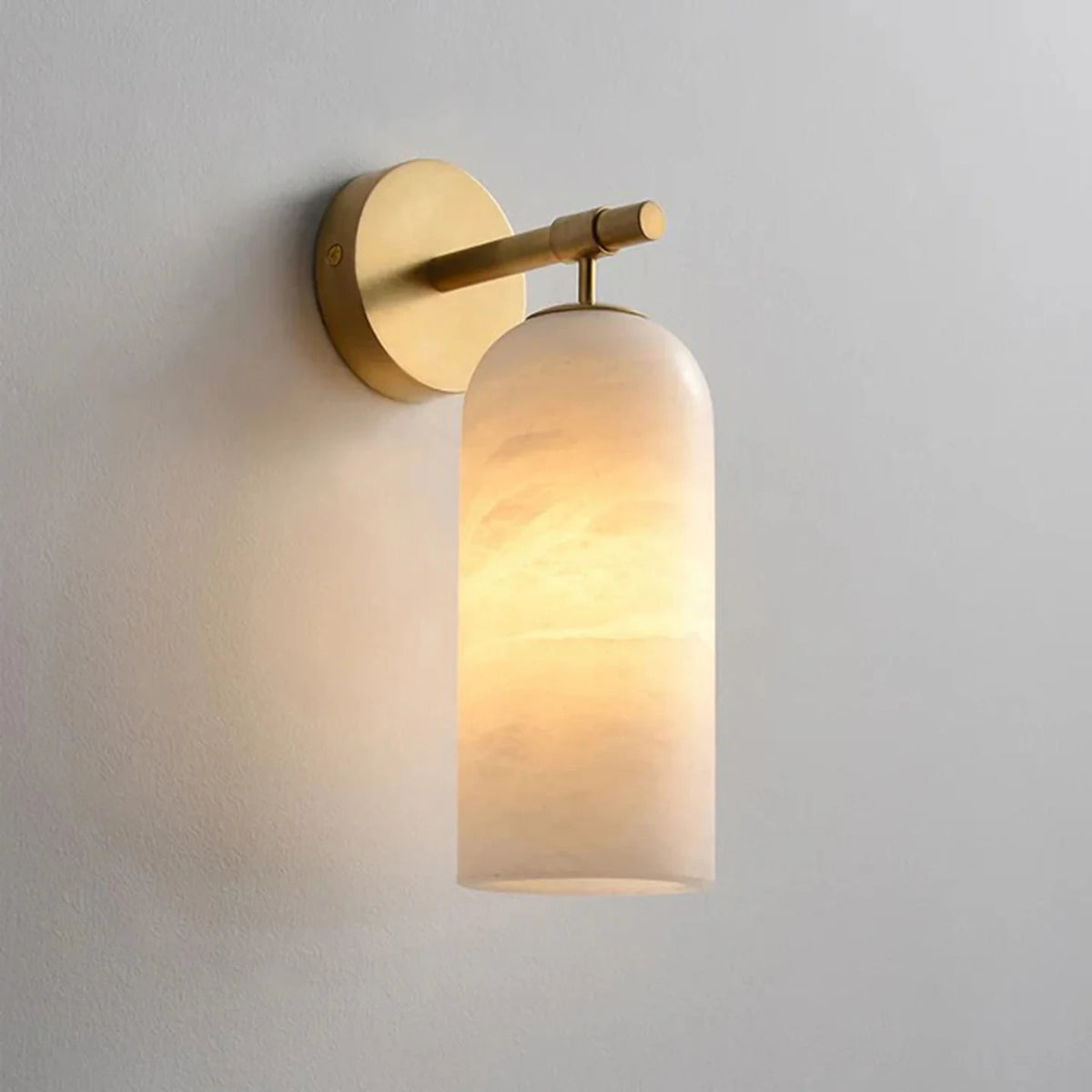Illuminated Modern Cylindrical Frosted Glass and Brass Wall Sconce Studio Shot