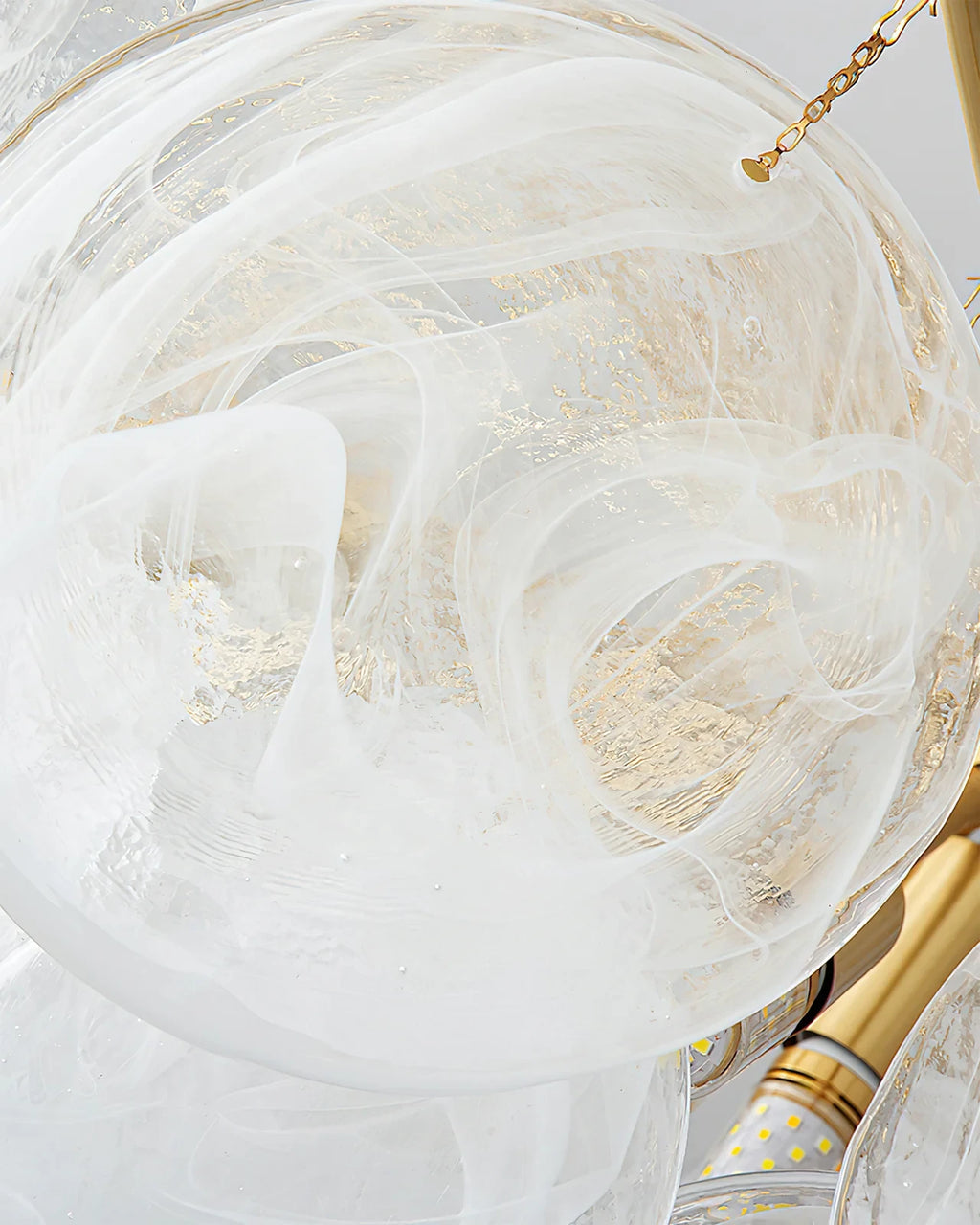 Close Up View of Textured Globe Glass Shades and Internal Bulbs Structure