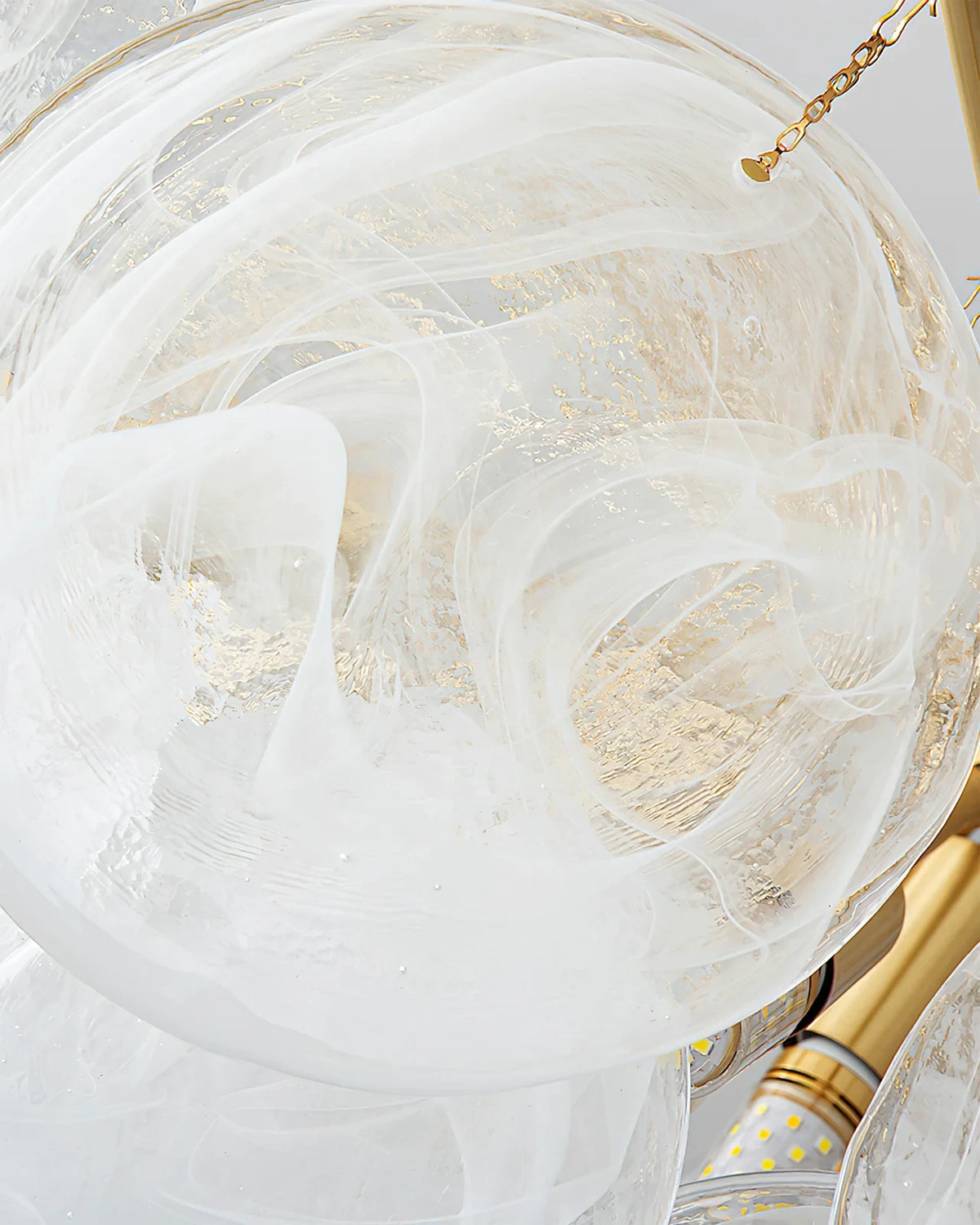 Close Up View of Textured Globe Glass Shades and Internal Bulbs Structure