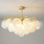 Illuminated Modern Brass Large Globe Art Glass Chandelier Studio Shot