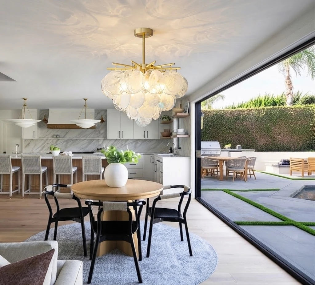 Modern Brass Globe Textured Chandelier Over Kitchen Dining Area