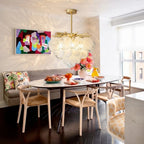 Modern Brass Globe Textured Chandelier in Elegant Dining Setting