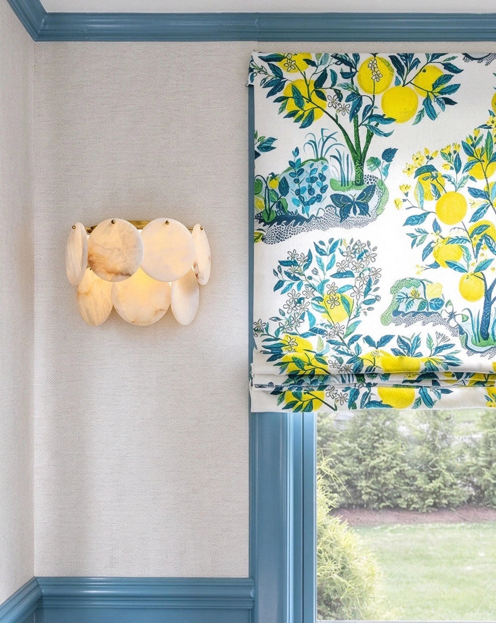 Modern Alabaster Disc Wall Sconce in Bright Interior Setting