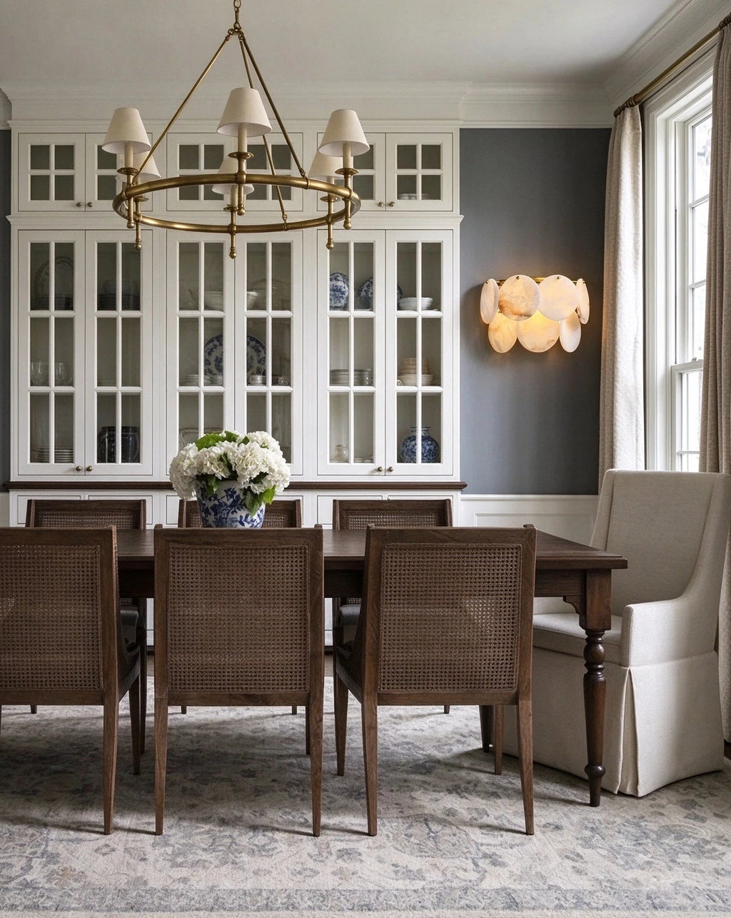 Modern Alabaster Disc Wall Sconce in Formal Dining Room