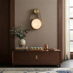 Modern Alabaster Disc Wall Sconce in Contemporary Living Room