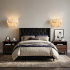 Modern Alabaster Disc Wall Sconce in Elegant Master Bedroom