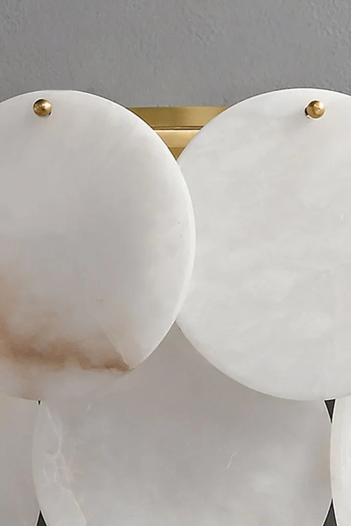 Close Up View of Layered Alabaster Discs and Brass Hardware Connection Details