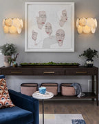 Modern Alabaster Disc Wall Sconce in Contemporary Living Space