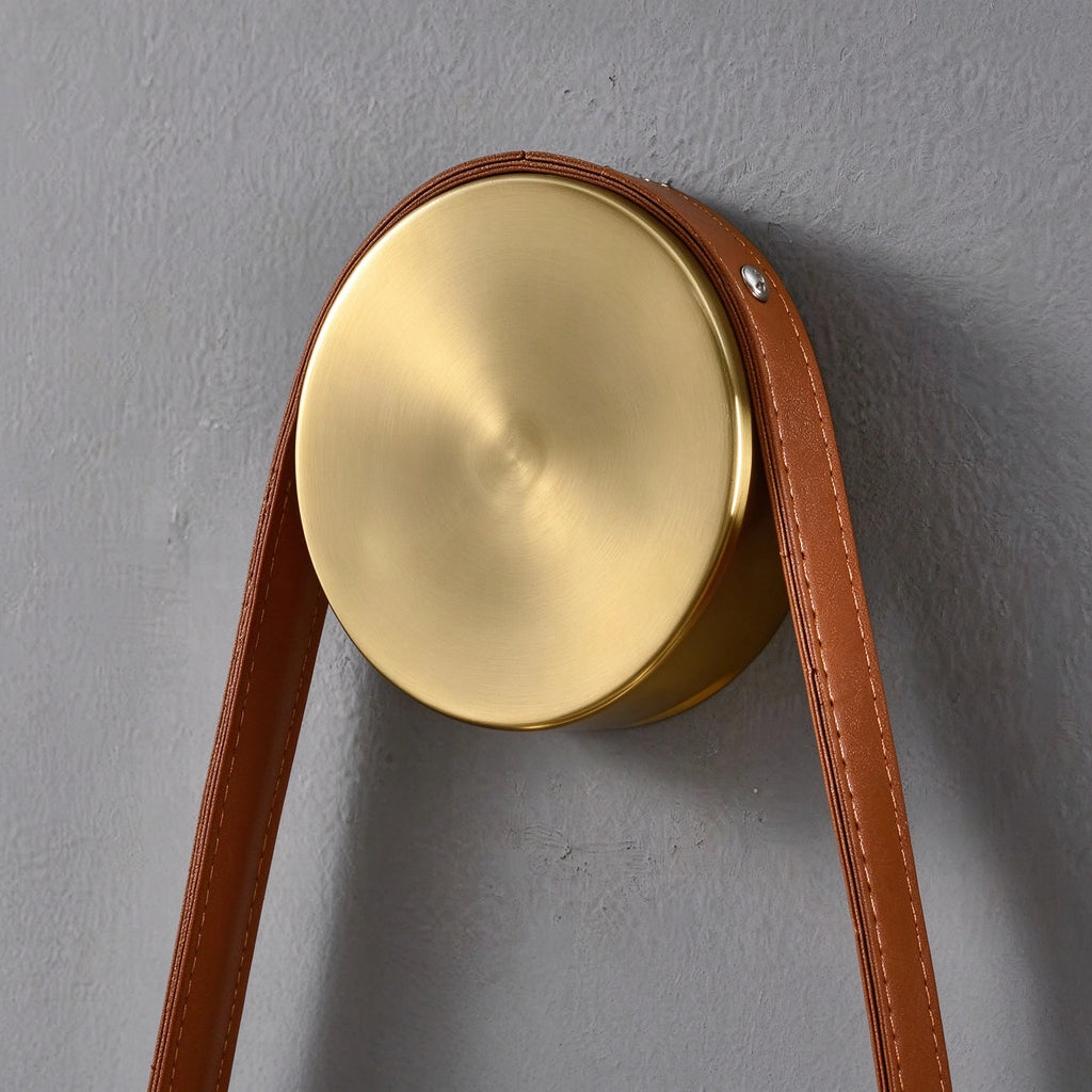 Close Up View of Leather Strap and Brass Wall Mounting Canopy Details