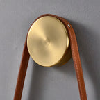 Close Up View of Leather Strap and Brass Wall Mounting Canopy Details