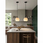 Modern Alabaster Half-Globe Pendant Light in Open Kitchen Dining Area