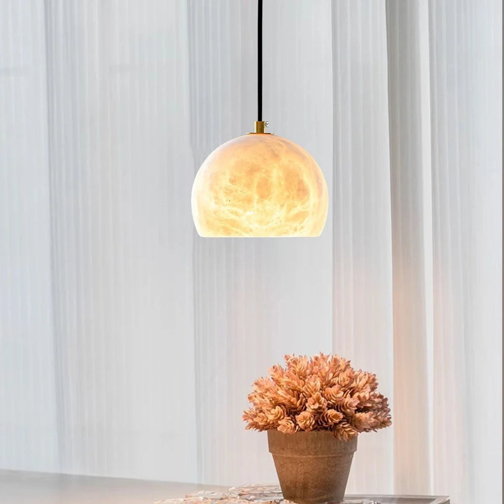 Modern Alabaster Half-Globe Pendant Light Against Window Light