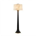 Modern Black Trumpet Base and Alabaster Shade Floor Lamp with Warm Light and Brass Trim on Pure White Background