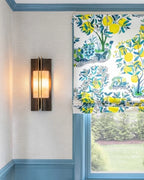 Modern Dark Winged Base Wall Sconce in Bright Interior Space