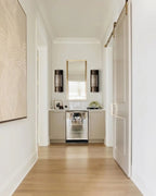 Modern Alabaster Cylinder Wall Sconce in Designer Hallway Space