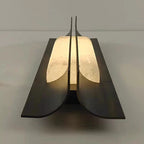 Illuminated Modern Alabaster Cylinder Wall Sconce Top View Studio Display